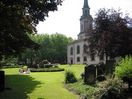People relaxing in the grounds of St Pauls church